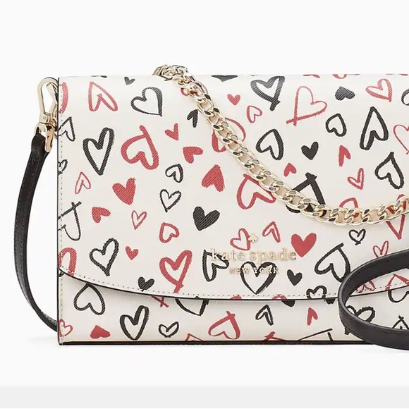 Brand new Kate Spade clutch with crossbody strap option. - Picture 2 of 3